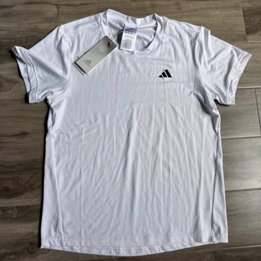 New t-shirt by Adidas in size XS